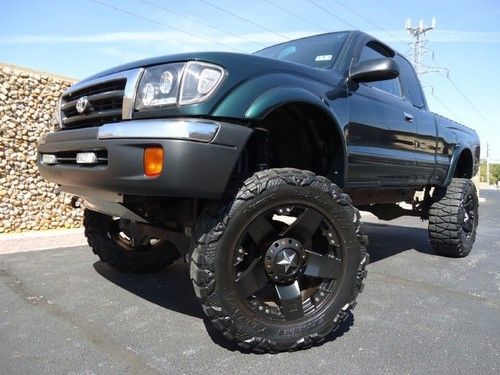 V6-tacoma-lifted-20 rockstars-ext cab-nice-remote start alarm-tx trk-kenwood cd