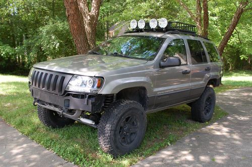 2001 jeep grand cherokee locked, lifted, geared
