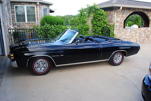 1971 chevelle convertible, triple black all original, bucket seats, console.