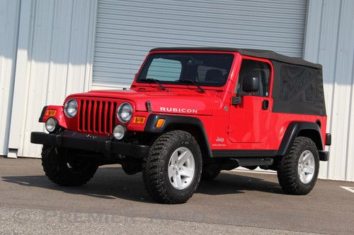 Automatic,flame red,goodyear wrangler m/t tires,cruise,cold a/c,1 owner, fl jeep