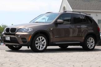 Sparkling bronze metallic awd premium pkg navigation like new only 8,700 miles