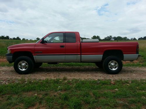4x4 49,000 miles automatic transmission cummins diesel red and gray longbed
