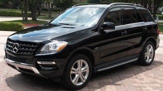 2012  mercedes ml350 bluetec black   pano roof nav backup camera heated seats