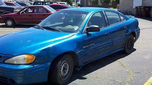 2000 pontiac grand am 236,428 miles have key starts &amp; runs check engine lite on