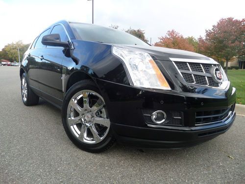 2012 cadillac srx/ no reserve/ navigation/ back up camera/ panoroof/ leathe