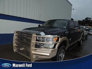 11 f350 4x4 lariat, navi, sunroof, ranch hand front bumper,headache rack,1 owner