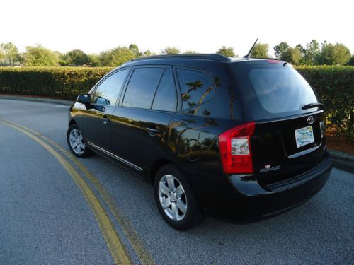 2008 kia rondo lx     great miles per gallon  and  + factory warranty of 15,000