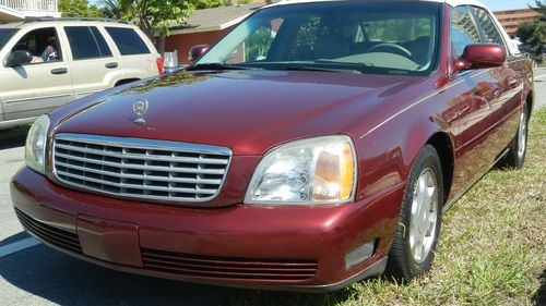 2000 cadillac sedan deville florida low miles 85k( one owner)...........