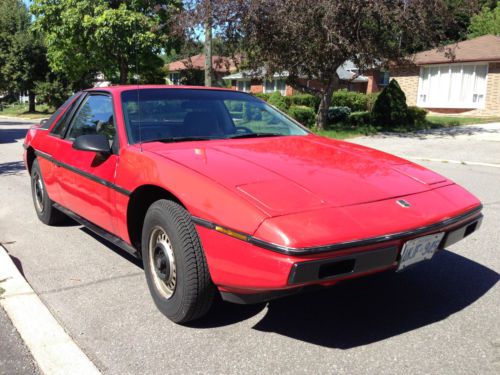 Red pontiac fiero 1984 refurbished and running perfectly