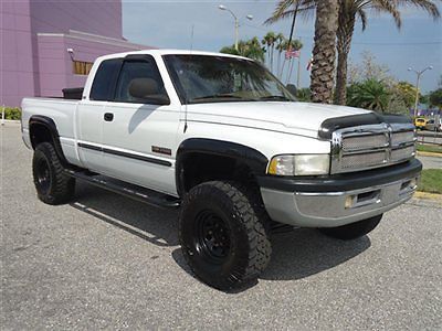 Lifted 5.9l diesel leather 4x4 quad short toolbox nice clean truck fl