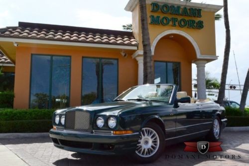 Bespoke racing green, custom teak deck,wood wheel, dash, door uppers,1 of a kind