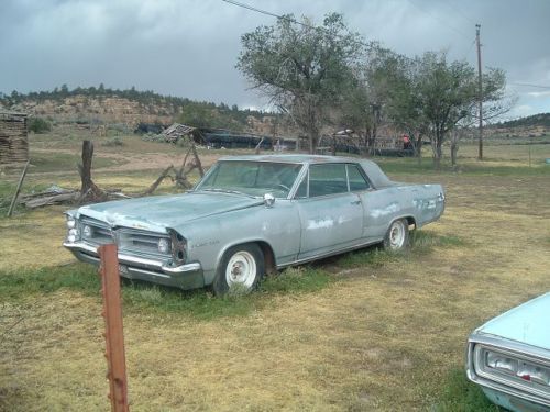 1963 grand prix, rust free and straight new mexico car, bucket seats, console