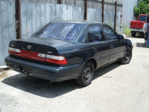 1996 toyota corolla dx sedan 4-door 1.8l no reserve!! runs and drives! cold ac!