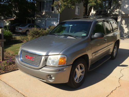 Gmc envoy sle 4d 2wd high millage mechanics special leather interior gold ext