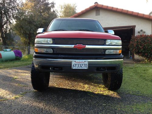 2002 chevy silverado 1500ls red 7in cst lift