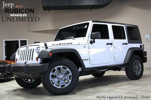 2013 jeep wrangler rubicon unlimited 5k miles! heated seats both tops navigation