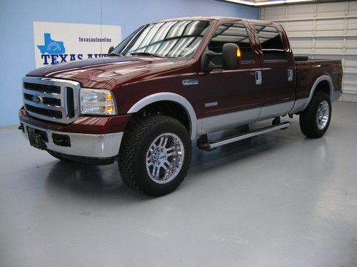 We finance!!!  2006 ford f-250 crew 4x4 fx4 lariat auto tow 6cd chrome rims!!