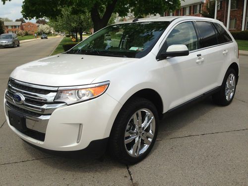 2011 ford edge limited,sync,navi w/backup camera,lthr,salvage rebuilt,no reserve