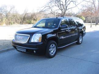 2007 yukon xl denali/all wheel drive/navigation/back up cam/sunroof/tv/dvd/nice