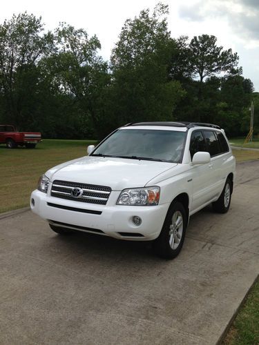 06 highlander limited hybrid 7 passenger 2wd 27-30mpg white tan leather