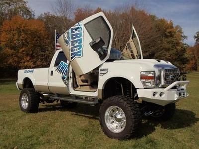 Lift kit! remote resi shocks ! road armor bumpers  lambo doors winch train horn