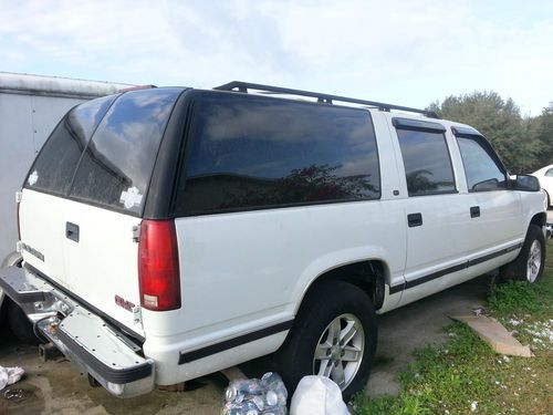 1998 3rd row seating, white with tan leather inside