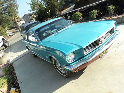 1966 mustang  runs good, 6 cyc, 3 speed  great car.