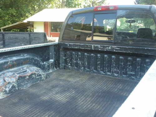 2003 ram 2500 4 door crew cab with larime package, lifted, and custom bumper