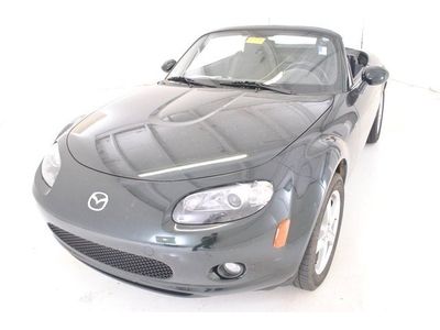 Grand tourin manual convertible 2.0l cd rear wheel drive aluminum wheels abs a/c