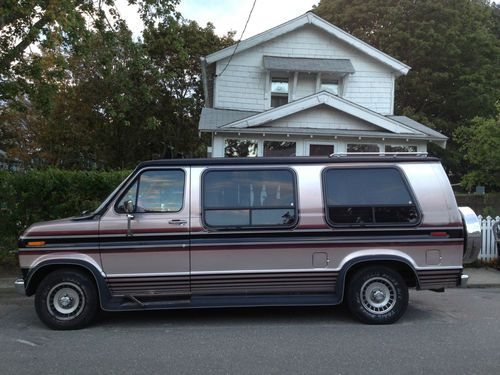 Unique ford e150 conversion van with pink interior