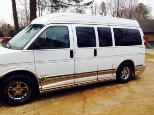 2003 limited custom explorer van, white, leather interior, good condition
