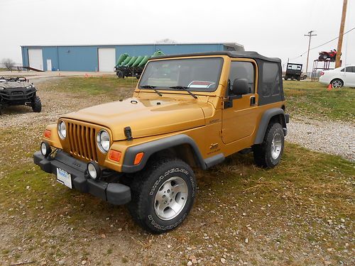 2003 jeep wrangler sport sport utility 2-door 4.0l   mizzou gold