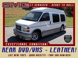 Leather interior-dvd/vhs entertainment system - quads-power fold out bed/3rd row