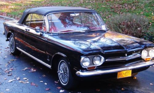 Cheverolet corvair convertible. black with red interior new tranny gararge kept