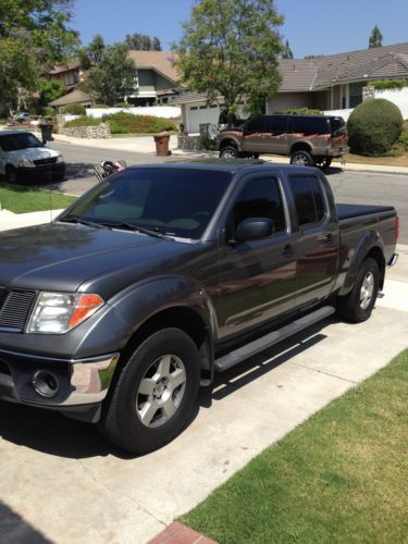 Gray nissan frontier crew cab long bed 2wd 4.0l