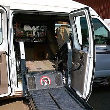 1998 ford e-150 hightop conversion van w/ ricon wheelchair lift, seats 2 chairs