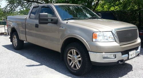 2005 4x4 ford f-150 lariat extended cab pickup 4-door 5.4l gold black leather