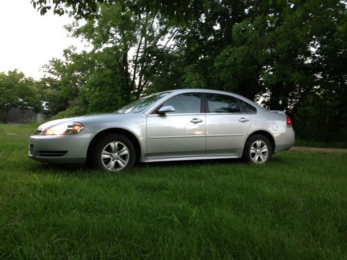 Silver, 48k miles, 6 speed automatic, v6, flex fuel