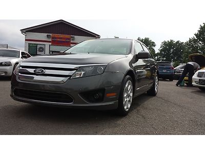 Beautiful 11" ford fusion se! must see! no reserve! xtra clean! dont miss out!