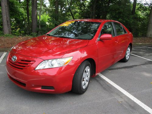 2009 toyota camry se sedan 4-door 2.4l barcelona red metallic