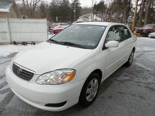 2005 toyota corolla le front wheel drive good gas mileage 4 door sedan  white