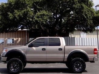 2006 gold xlt 5.4l v8 4x4 lifted two tone leather fuel wheels bushwacker flares