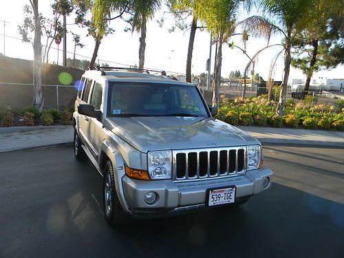 Loaded, silver w/ beige leather interior. navigation, backup camera, cd/stereo