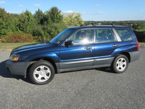 Dark blue 2005 subaru forester runs 100% 2.5l