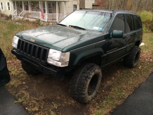 1997 jeep grand cherokee limited v8 lifted 4.5&#034; super swampers mud truck