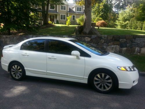 4-dr white sedan - auto transmission, tinted glass, sunroof, spoiler, new tires