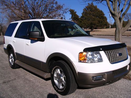 2004 white eddie bauer 5.4l 8 cyl. new tires, clean, low mileage, 3 rows/storage