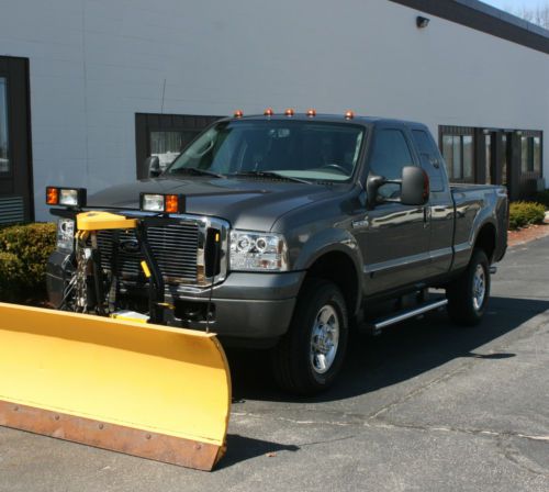 2006 ford f250 super duty w/plow loaded but dented