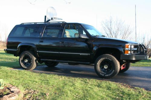 1999 chevrolet k2500 suburban 4wd, lifted and blacked out, with a 454 big block!