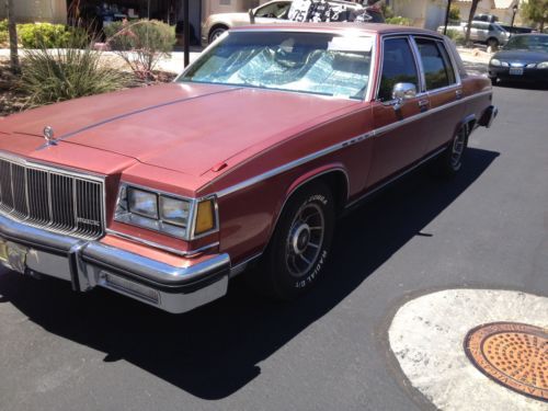 1983 maroon buick park avenue